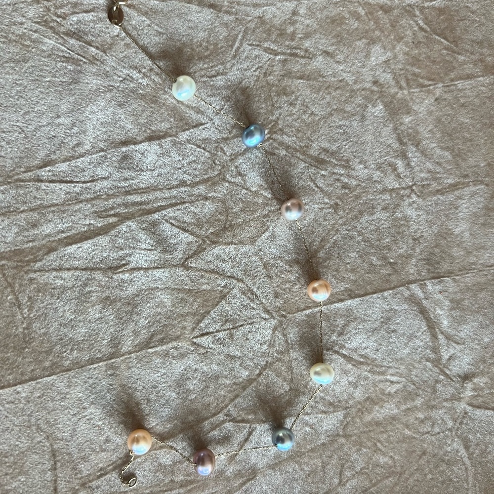 14 karat gold and pearl bracelet.